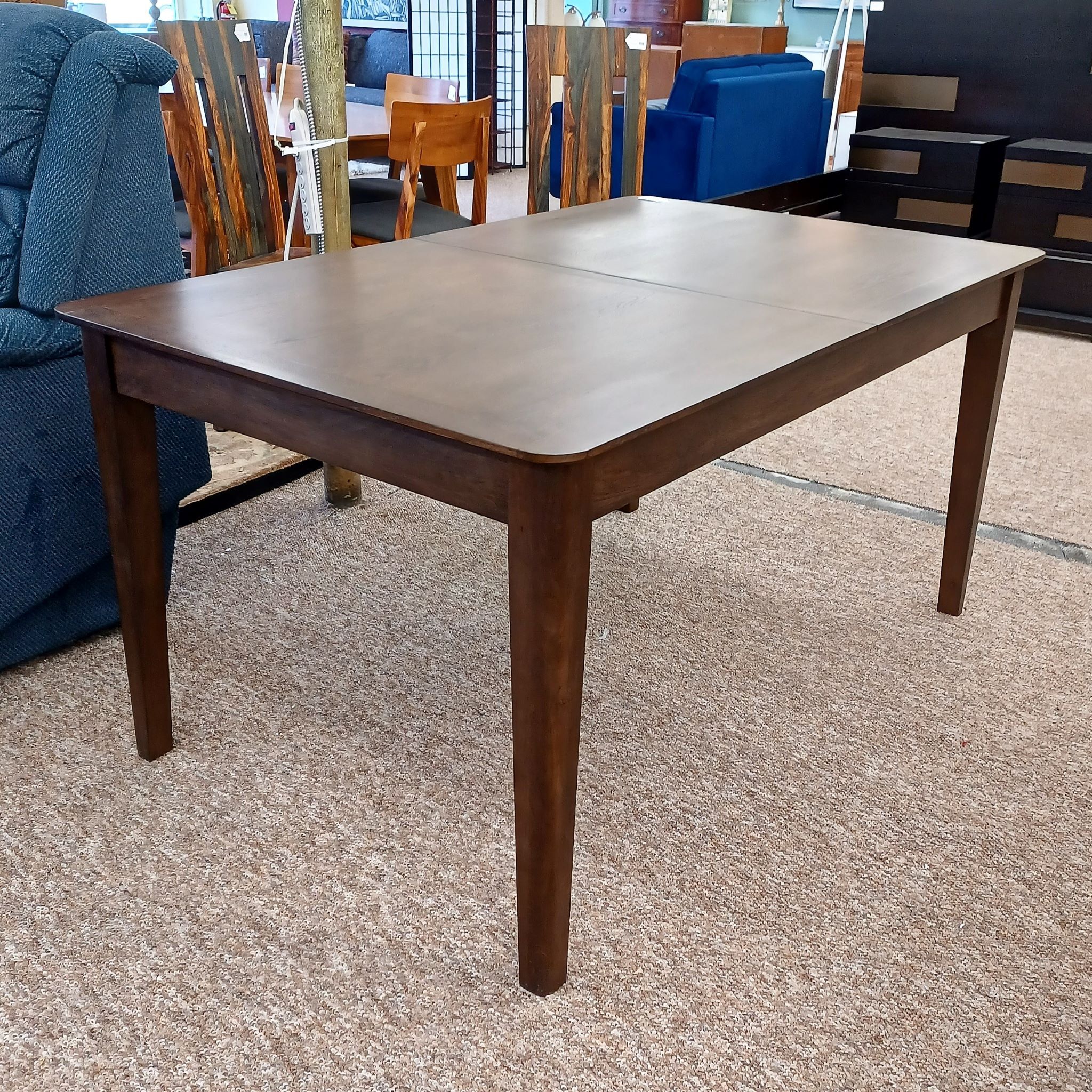 dark wood expanding dining table