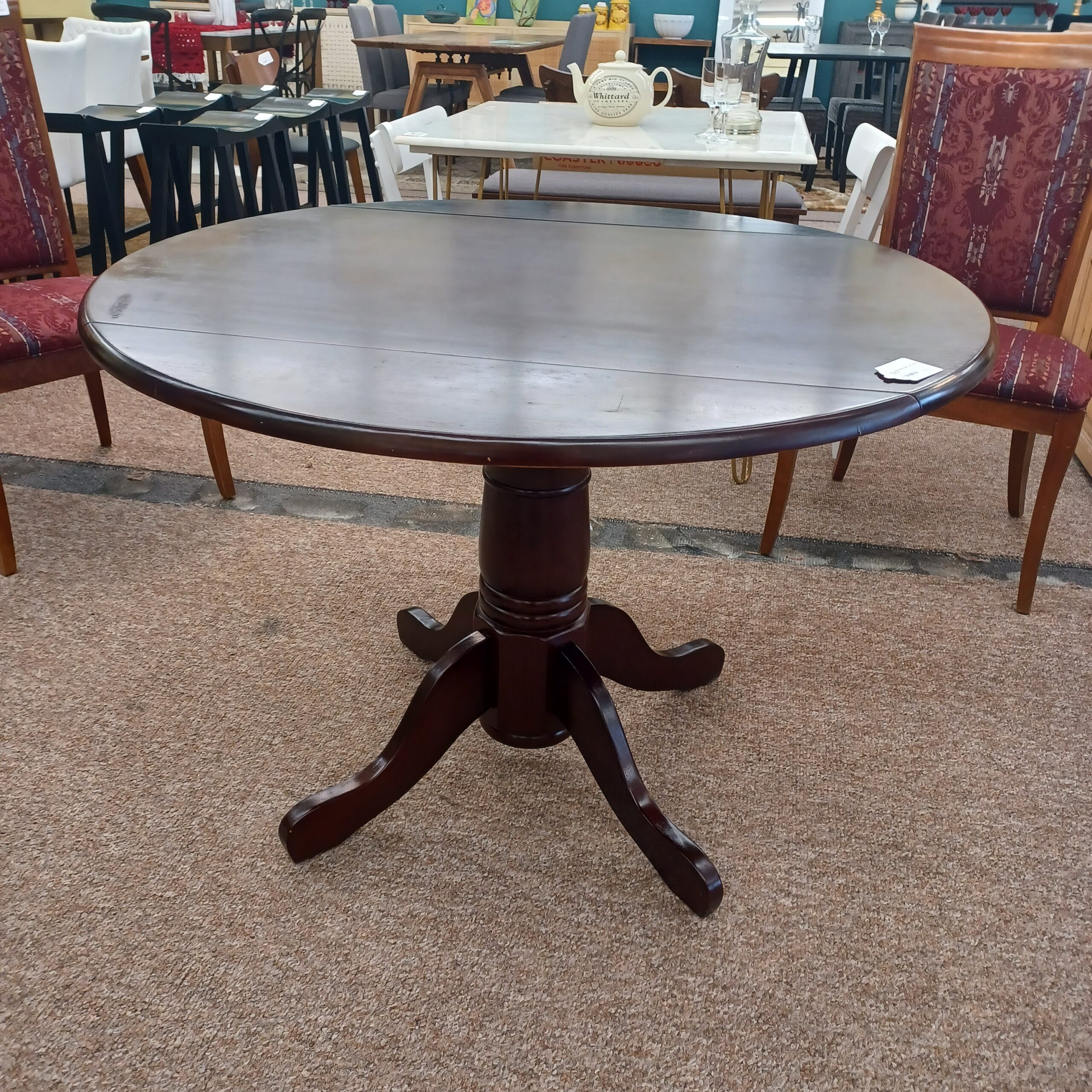 dark stain round dropleaf dining table