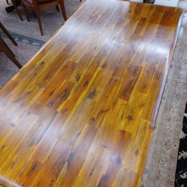 knotty wood tapered leg dining table