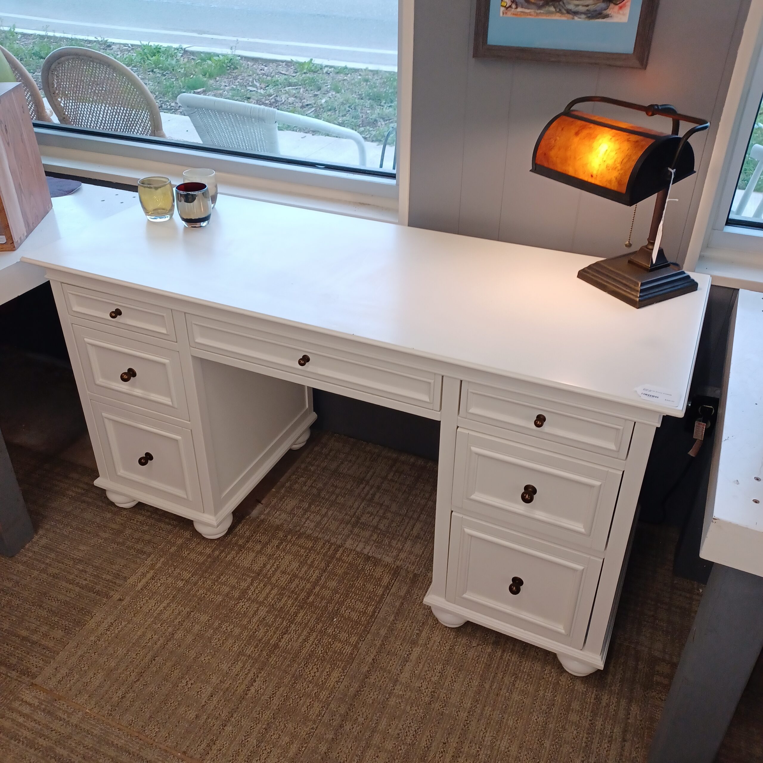 white seven drawer kneehole desk