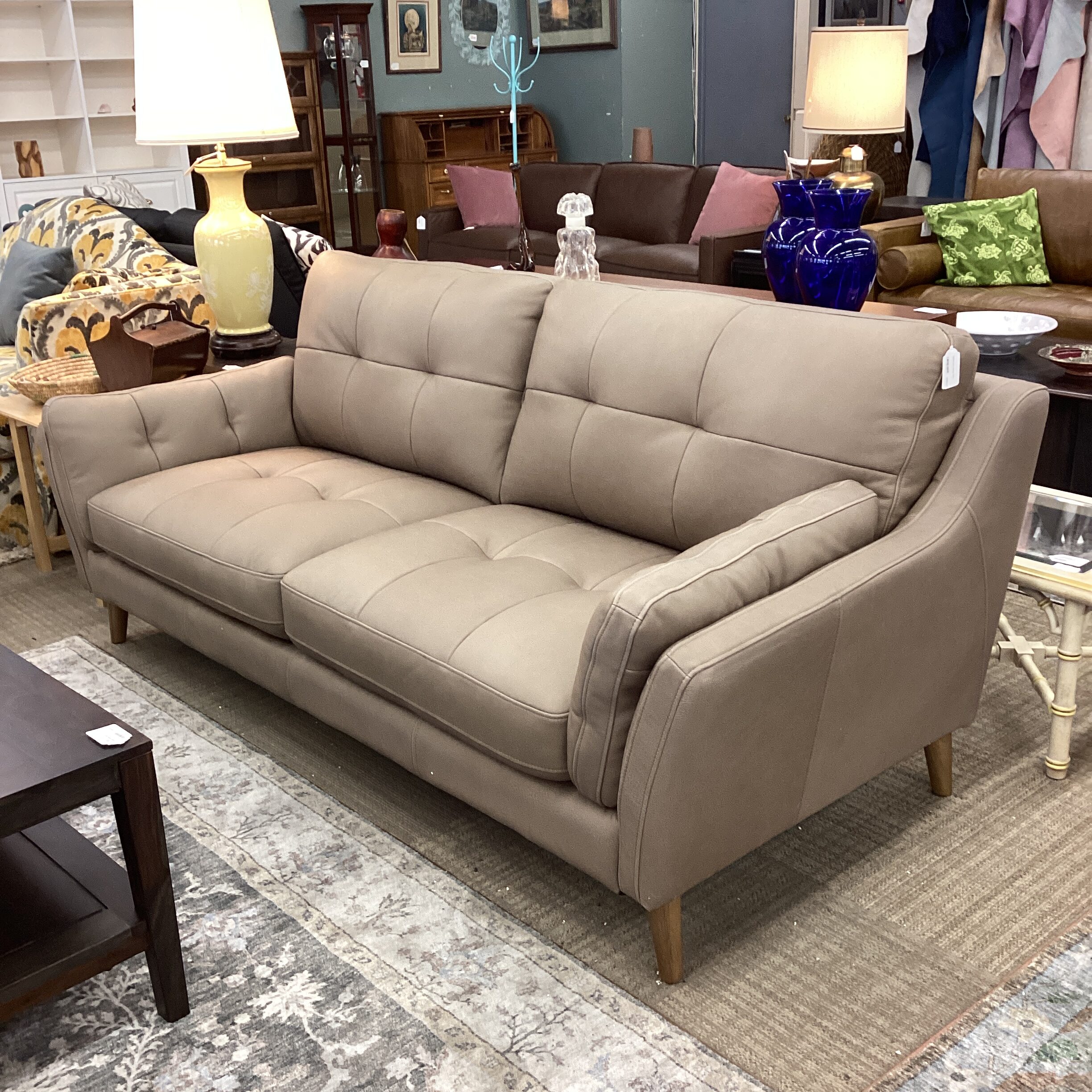 tufted latte leather sofa