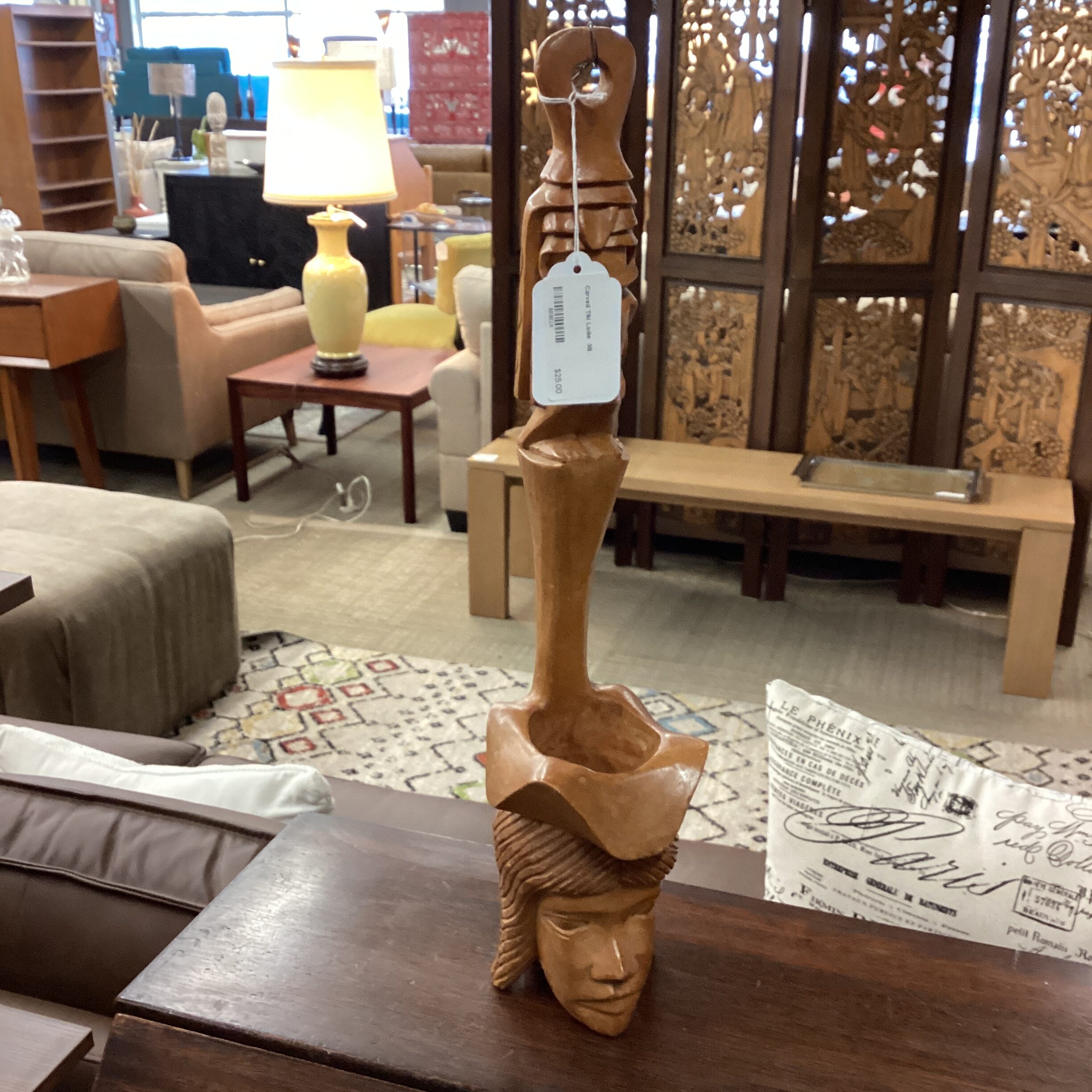 carved tiki ladle