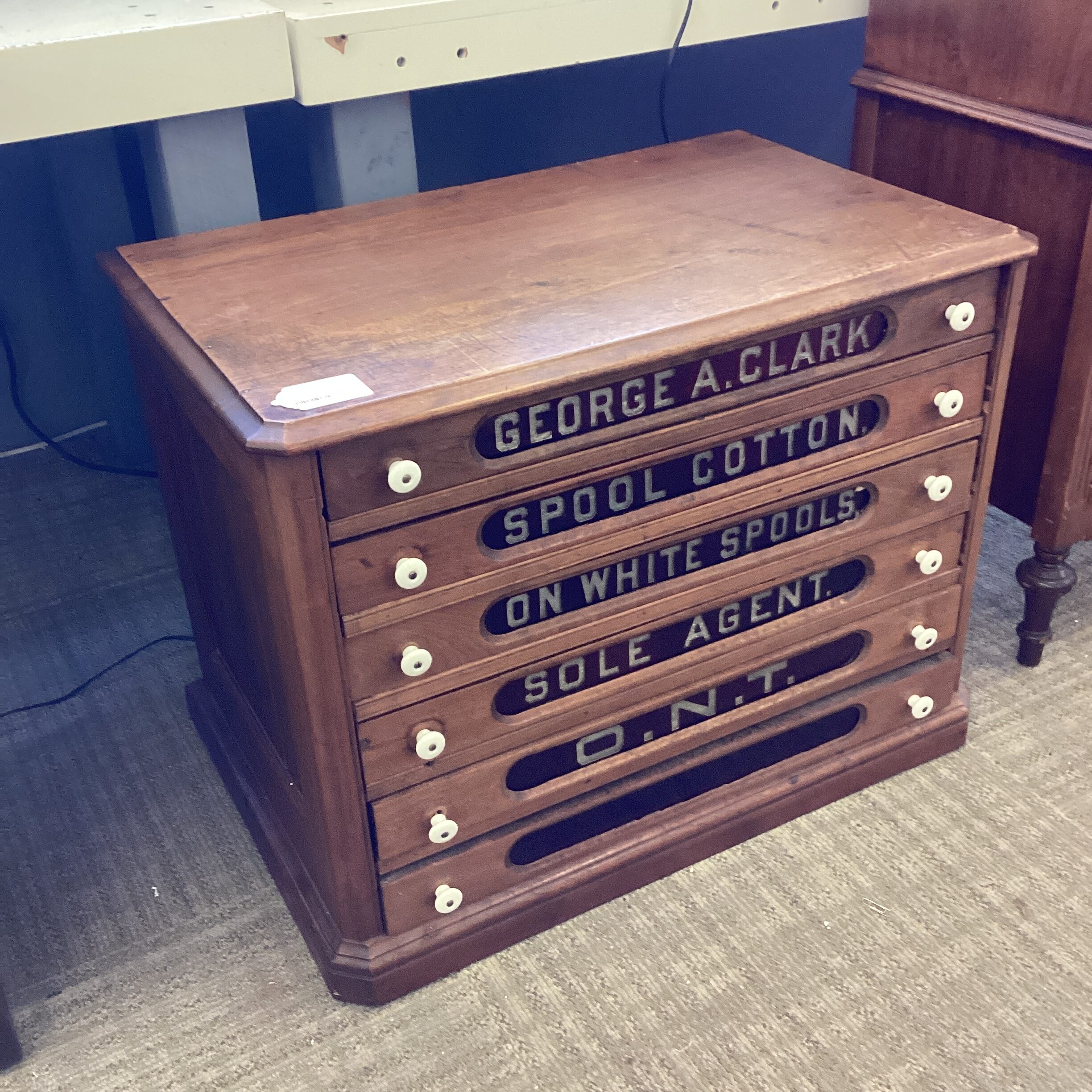 antique walnut spool cabinet