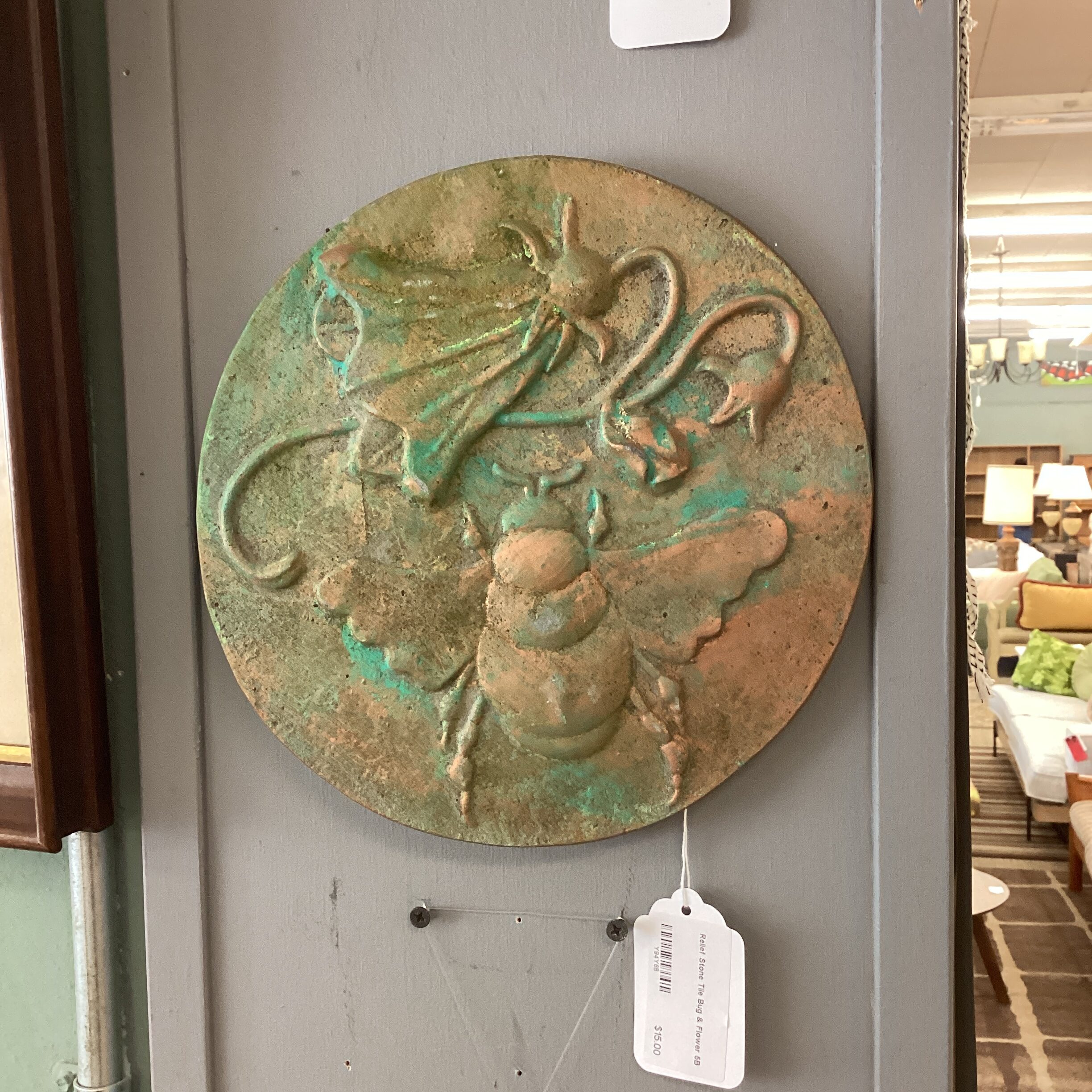 relief stone tile bug & flower