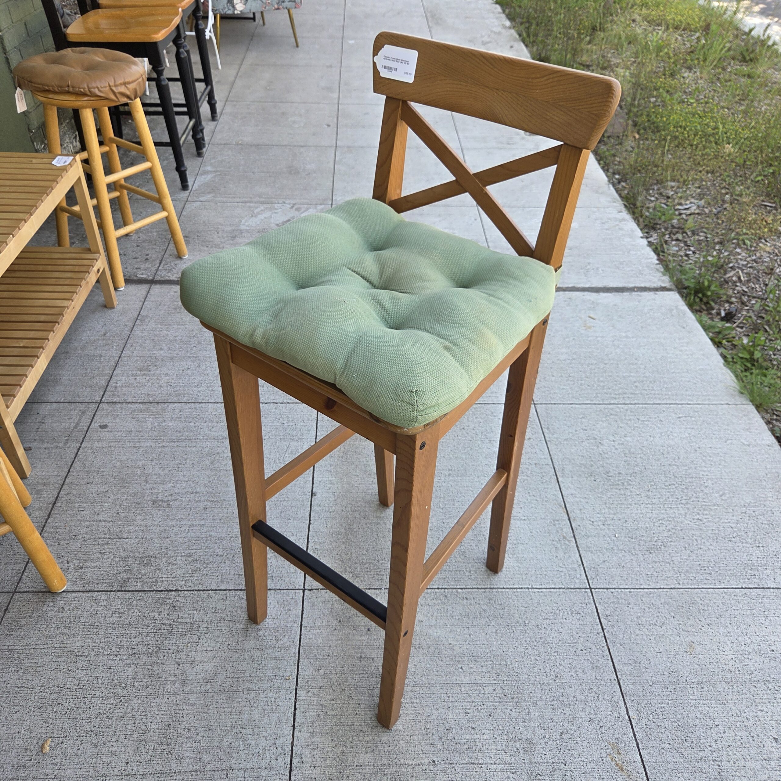 classic cross back barstool w/green seat pad (as is)