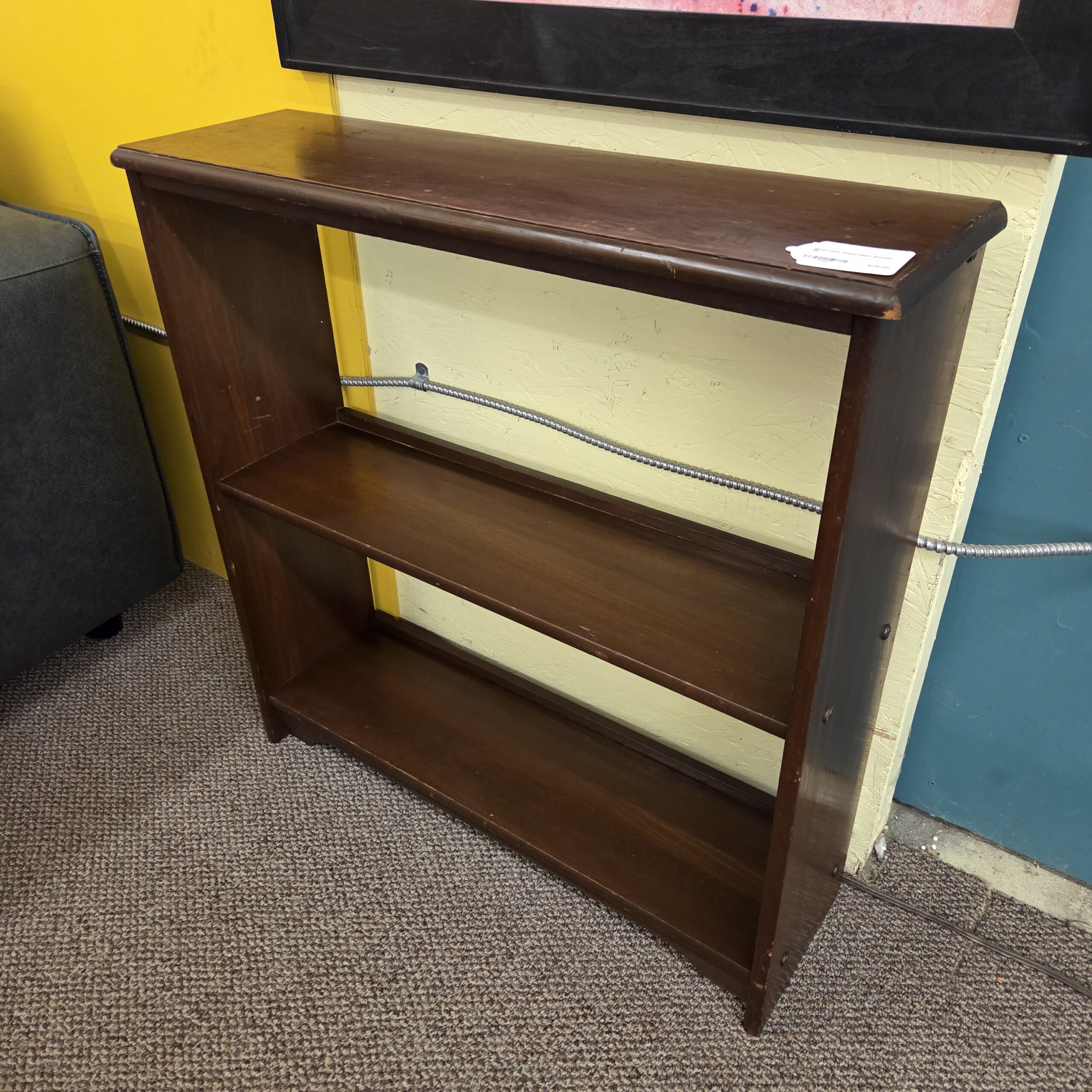 small dark wood open shelves