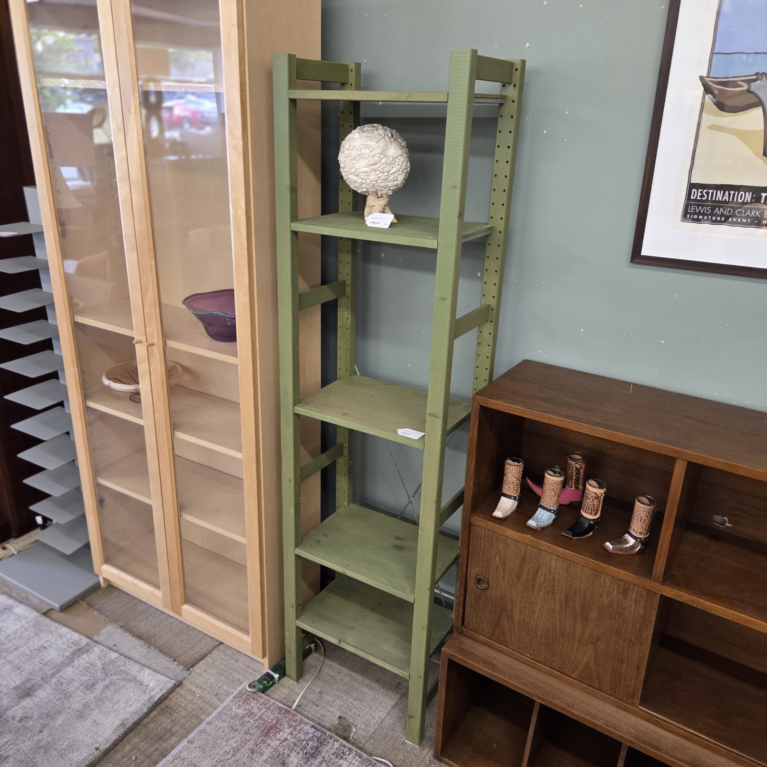 narrow green open shelves