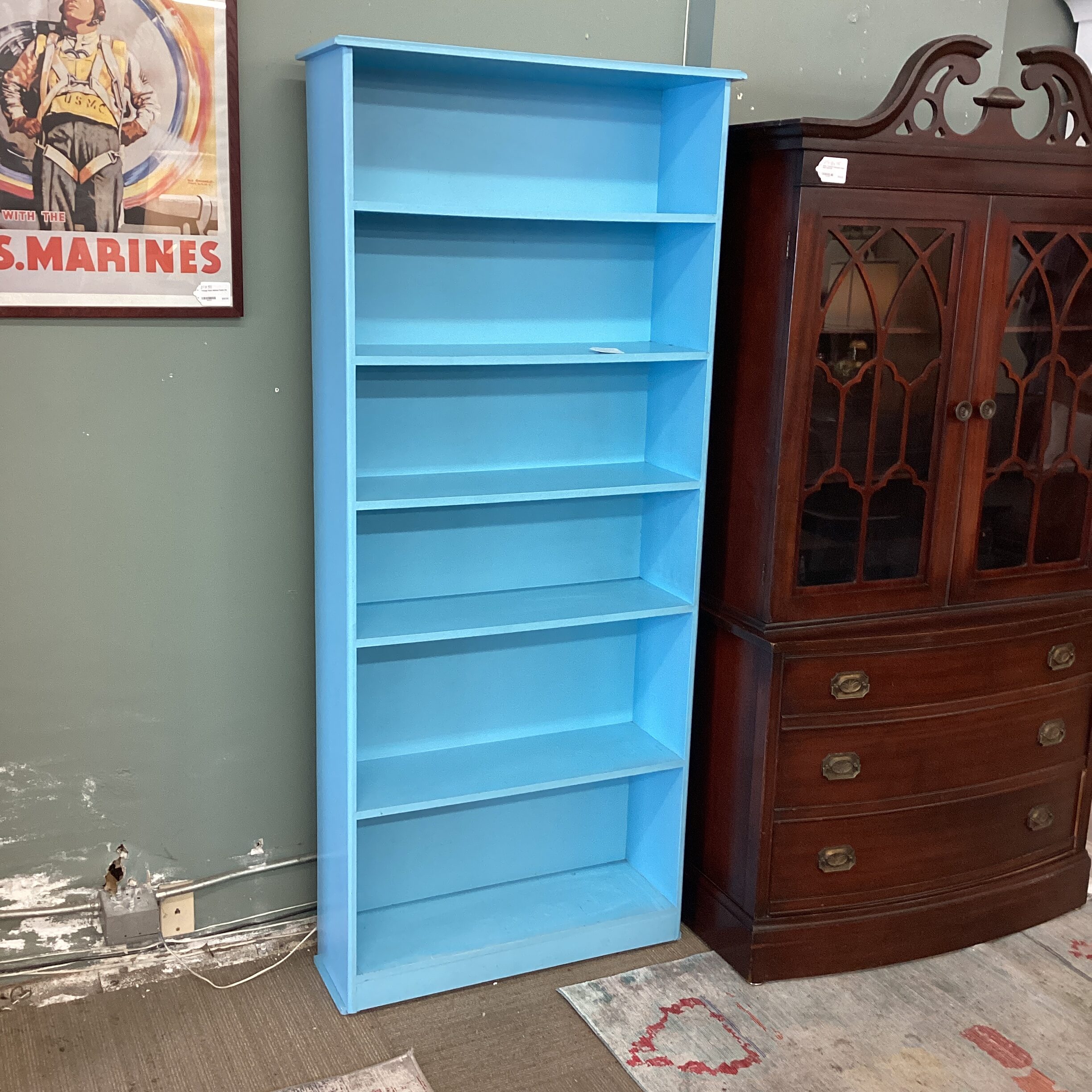 tall baby blue bookcase
