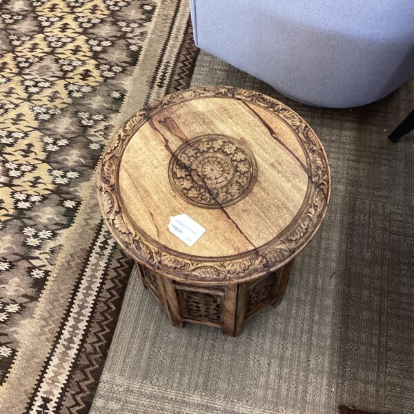 carved light wood leaf pattern side table