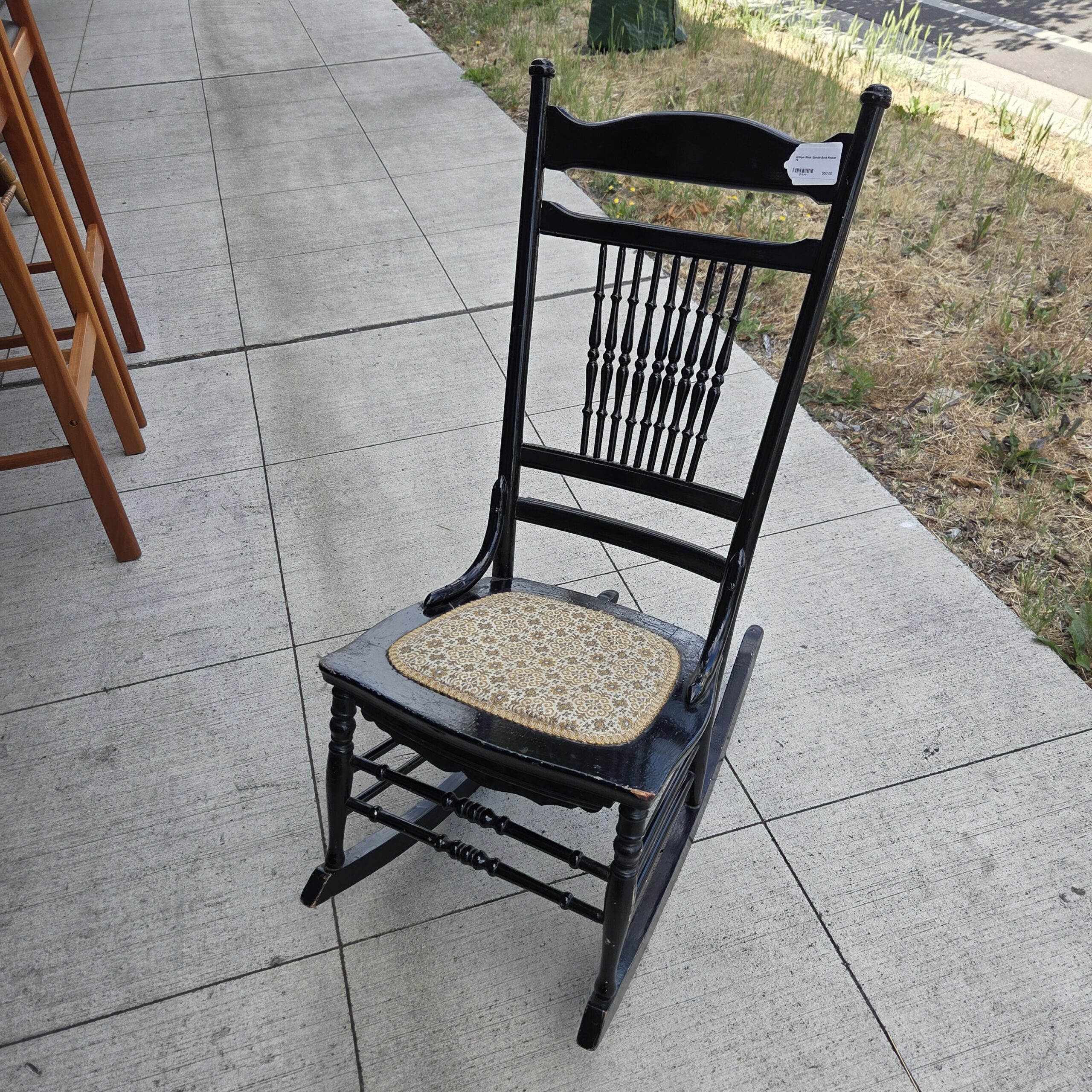 antique black spindle back rocker