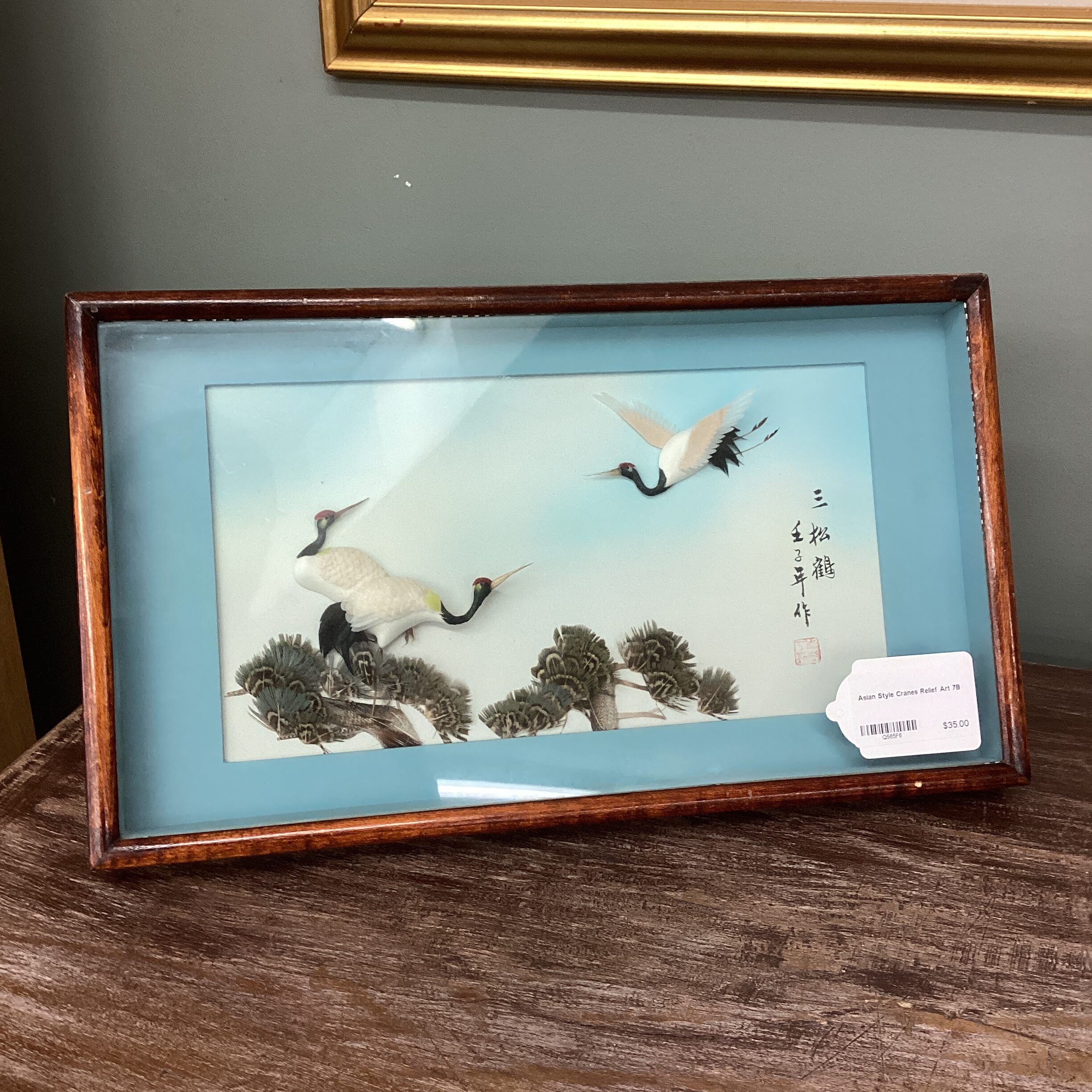 asian style cranes relief art