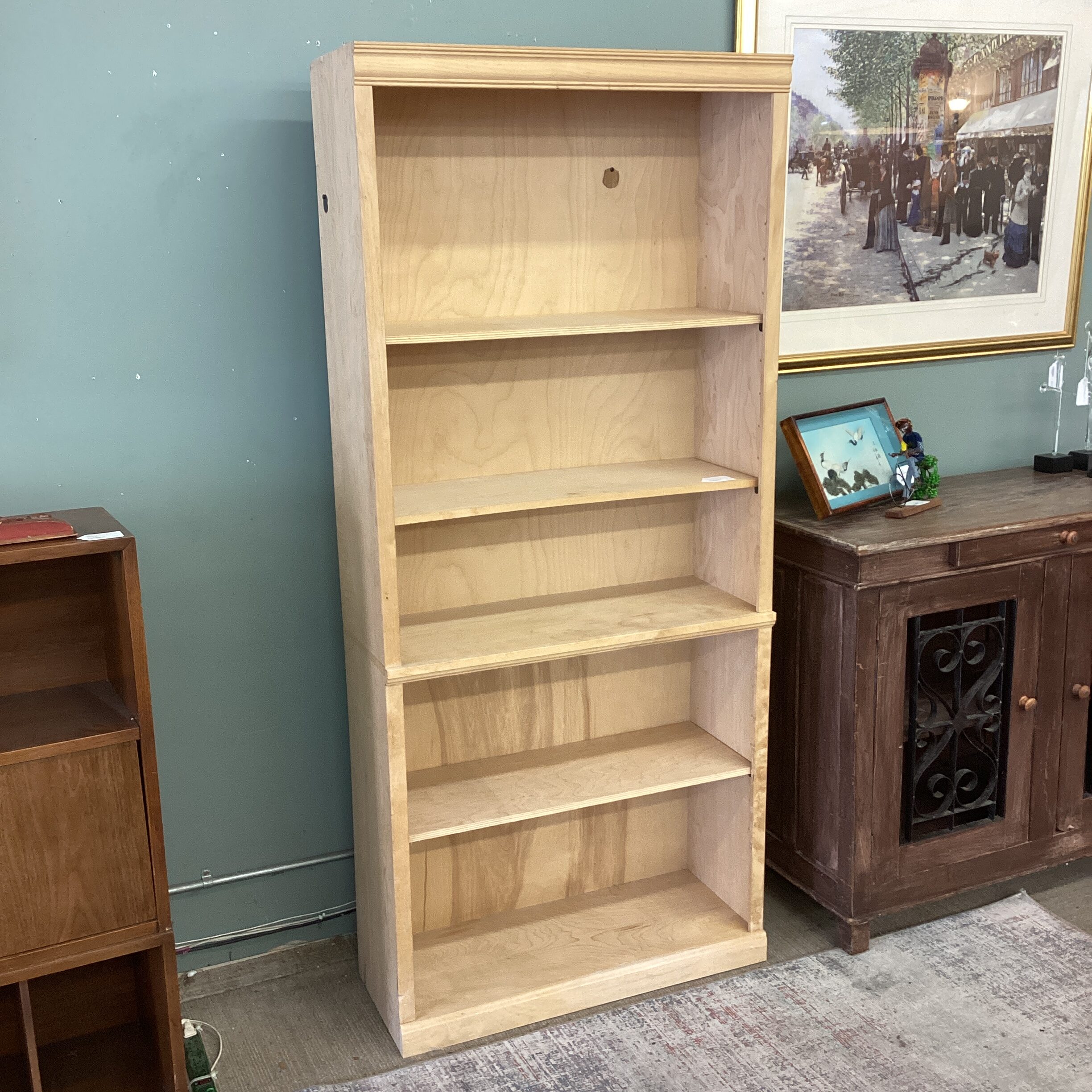 tall light wood bookcase