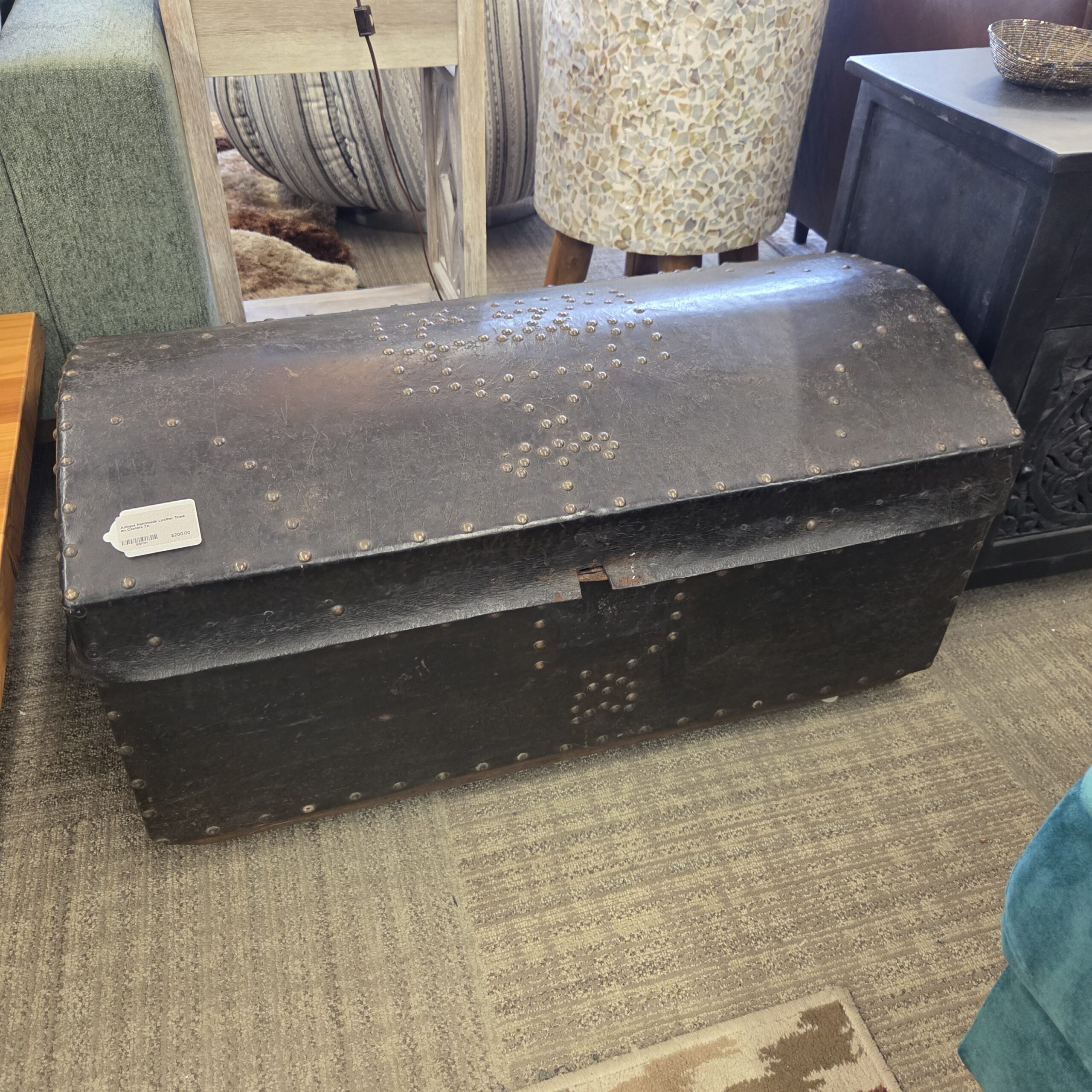 antique handmade leather trunk on castors