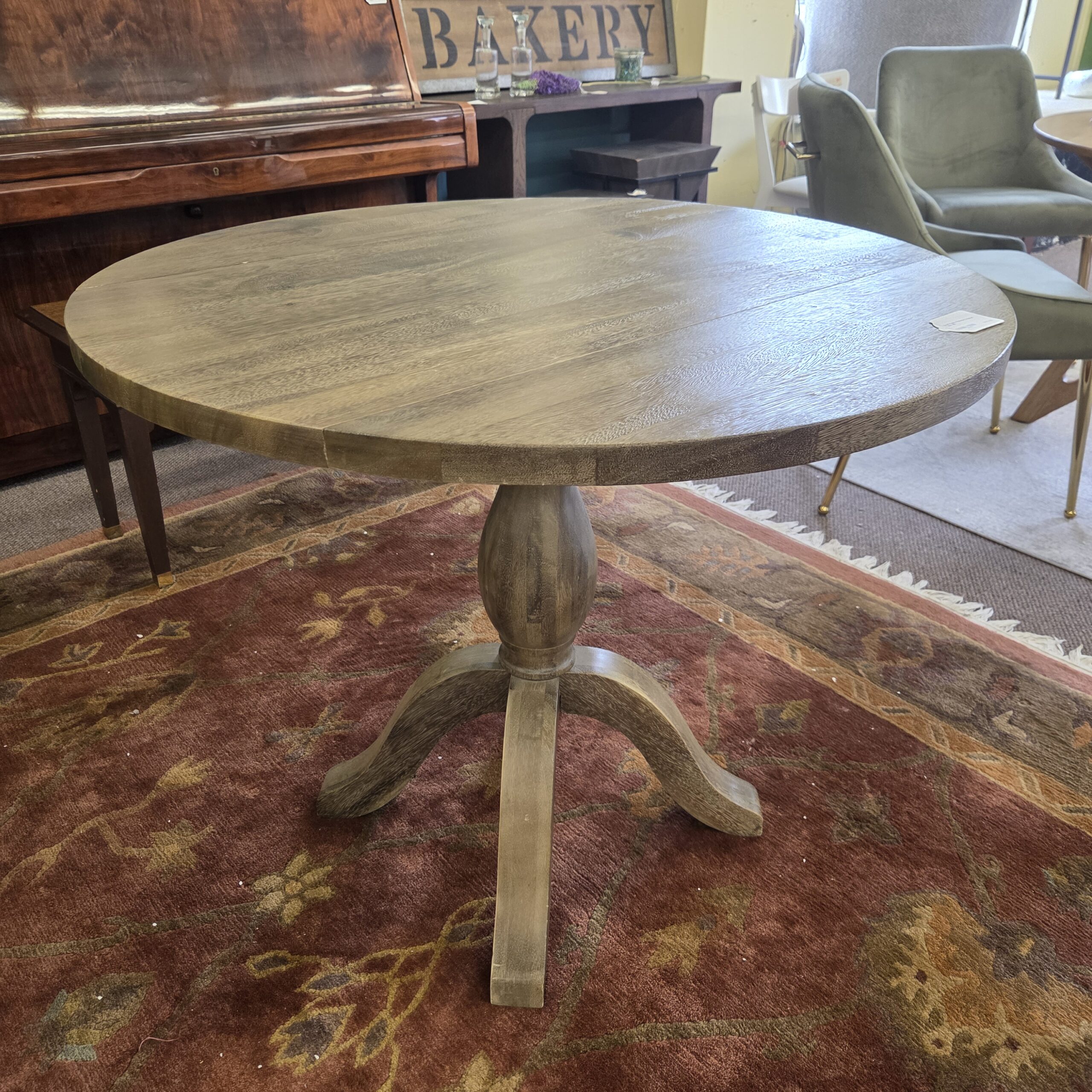 small rustic pedestal dropleaf table