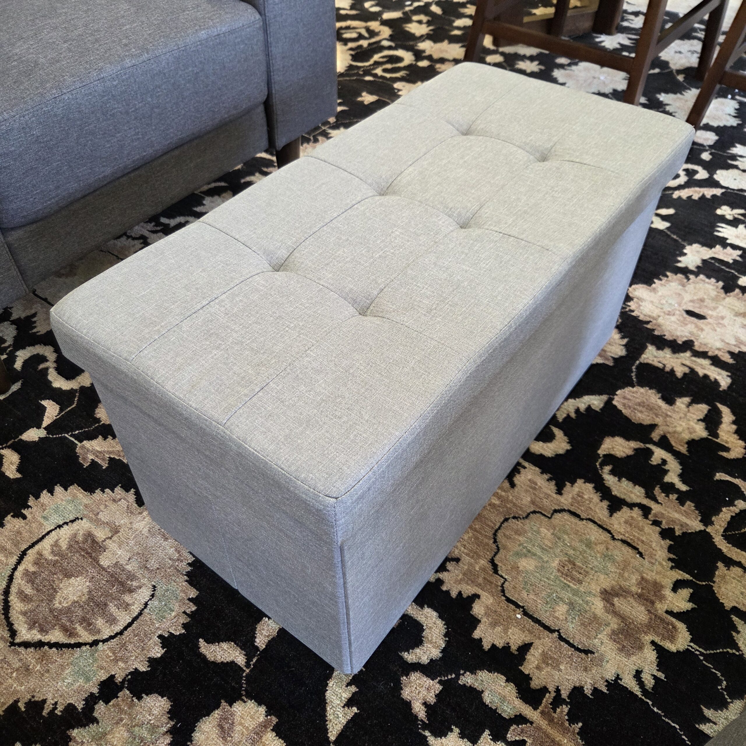 collapsible grey storage ottoman