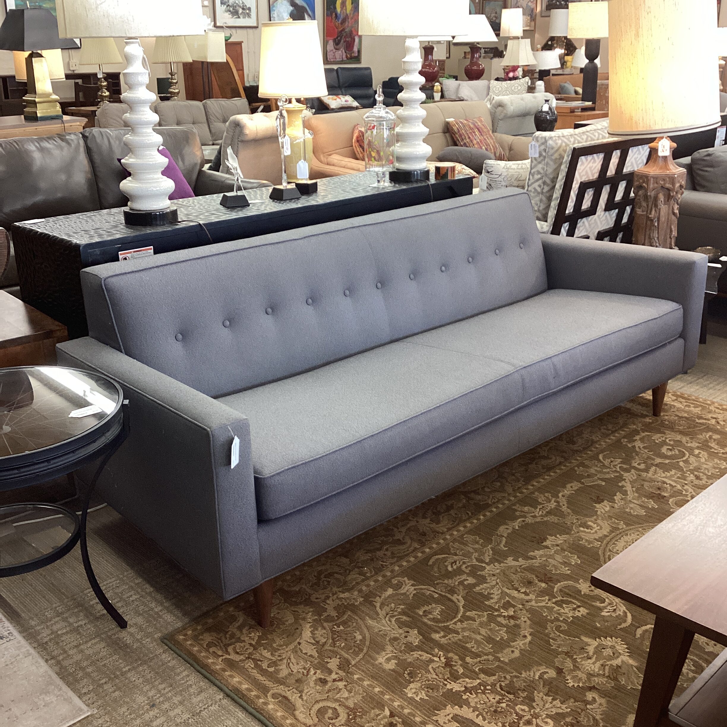 design within reach grey button tufted back sofa