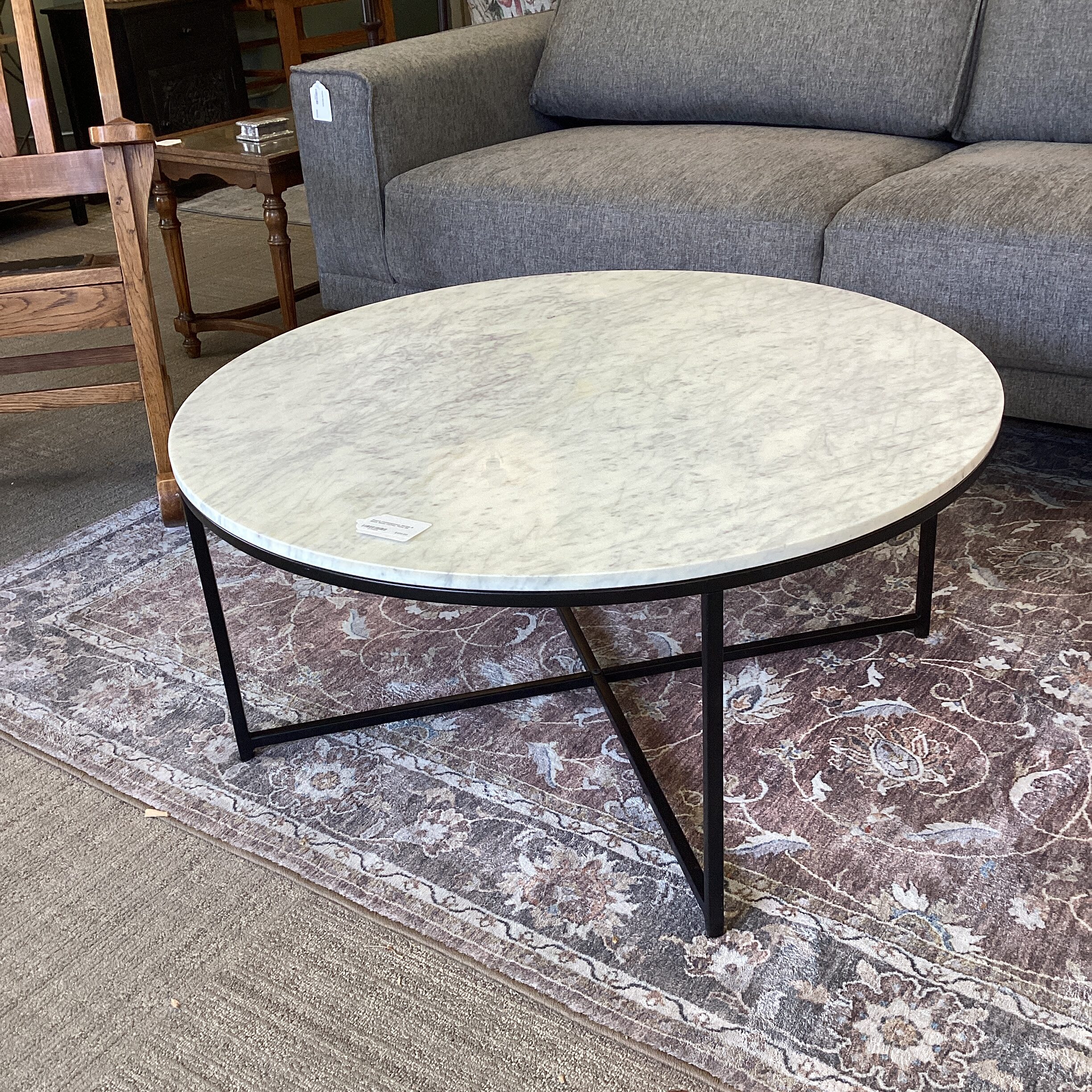 round contemporary marble & black metal coffee table