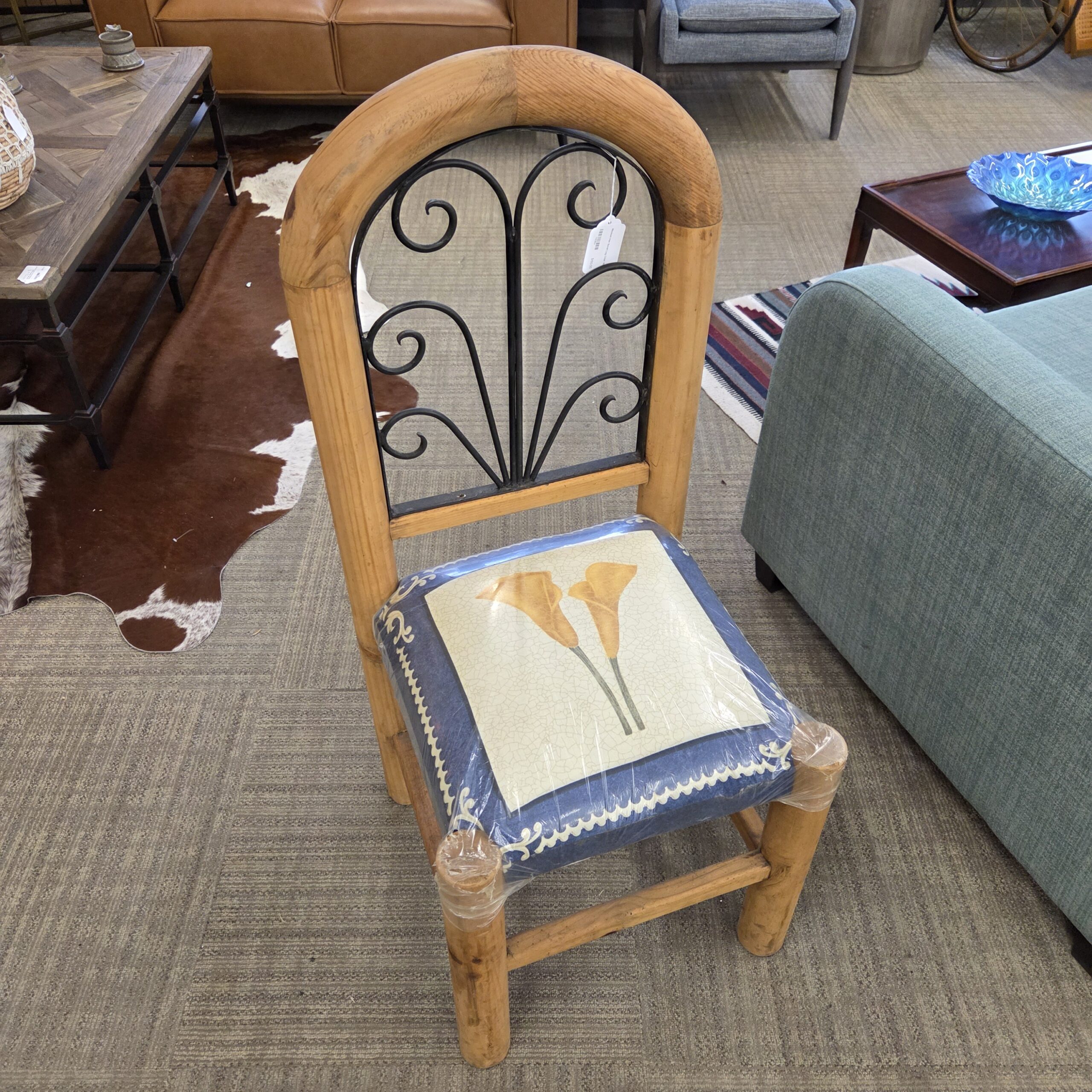 mexican iron scroll log chair